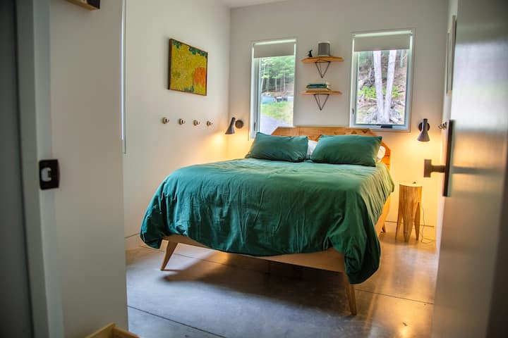 Bedroom #2 measures 8'-0" x 10'-2", and includes a full size bed.