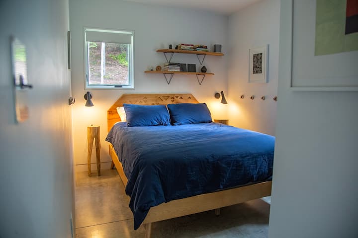 Master Bedroom.  All the bedrooms are on the smaller side.  This room measures 8'-8" x 11'-6", and includes a queen sized bed.