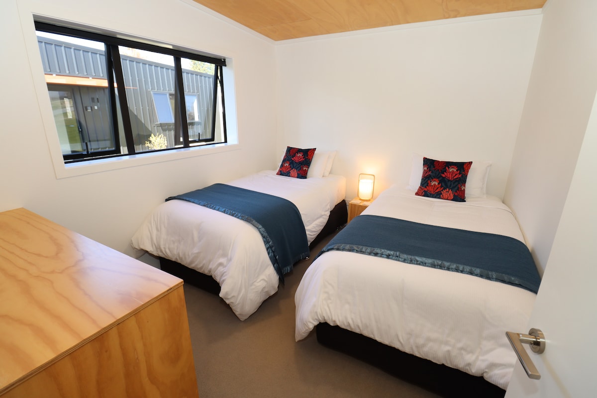 Bedroom with king singles.