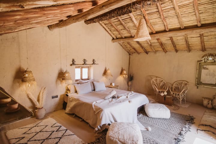 Room surrounded by dunes