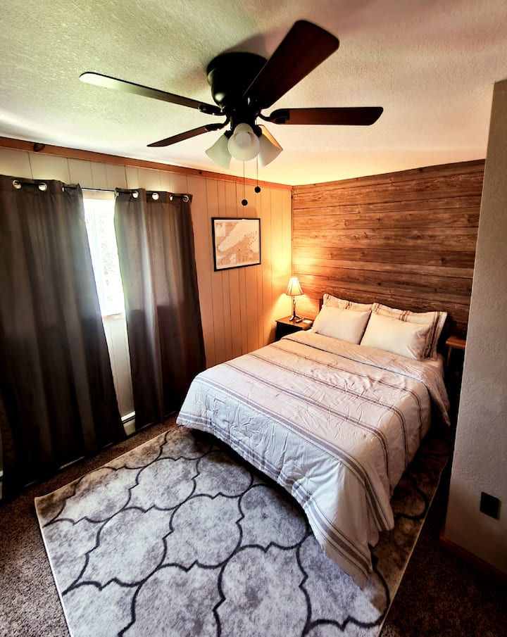 Private Bedroom with queen bed and futon sofa