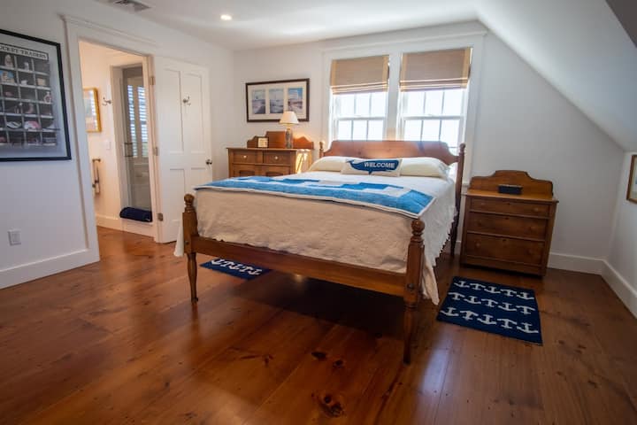 The third bedroom off the second floor seating area has a queen bed, walk-in closet, and private bath.