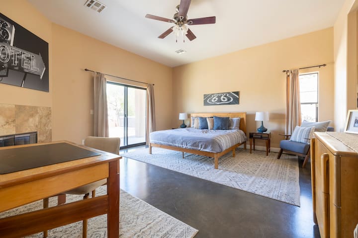 "A spacious primary suite larger than most hotel rooms, featuring a large Jacuzzi soaking tub, a separate shower, and a convenient workspace."