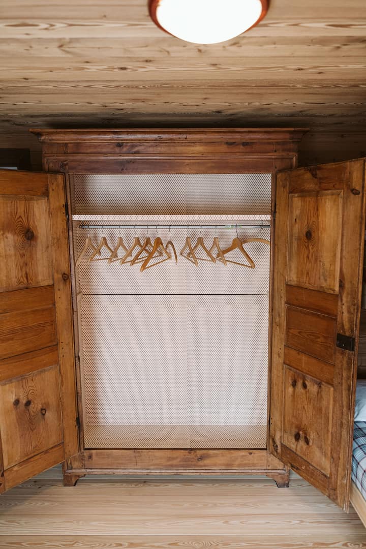 INTERIOR CLOSET WITH HANGERS