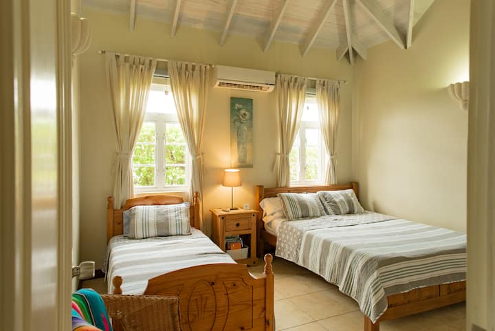 Additional Bedroom, 1 queen bed, 1 twin bed.  Additional roll away cots and crib available for set up