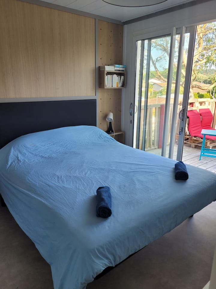 bedroom with Queen size bed & bay window on terrace