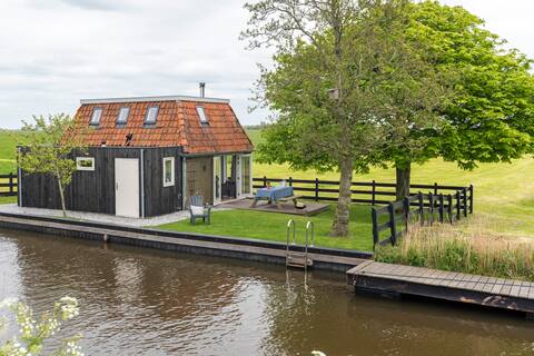 Former farm worker's house on the water