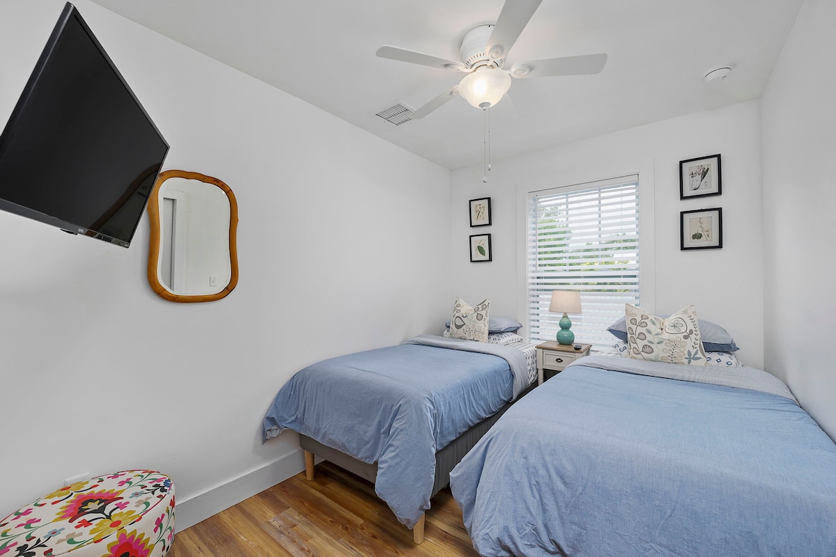 Upstairs bedroom with Twin Beds and TV. 