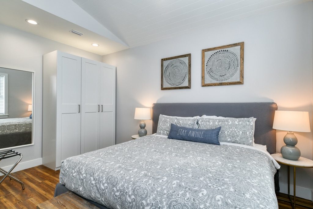 Primary first floor Bedroom with King Bed, spacious Ensuite Bath and wall hung TV. 