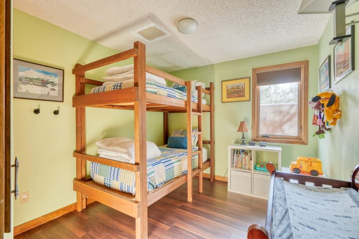 This bunk bed room is perfect for kids. The bottom mattress is thick and comfortable. The top mattress has a thinner, but still comfortable, memory foam for safety reasons. We also have a changing table for infants and plenty of toys for older kids.