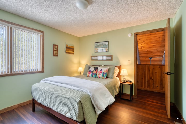 This queen-sized platform bed is on the upper floor.