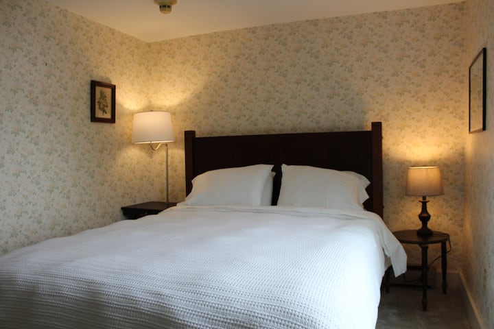 Room 8 - Queen bed (one of three bedrooms on the third floor) with newly renovated en suite bathroom