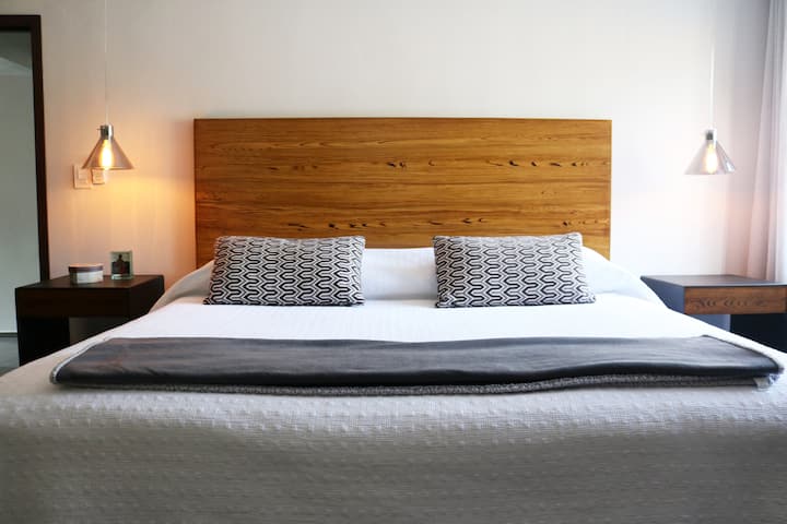 The master bedroom has a king-size bed and flat-screen tv with premium channels and Netflix.