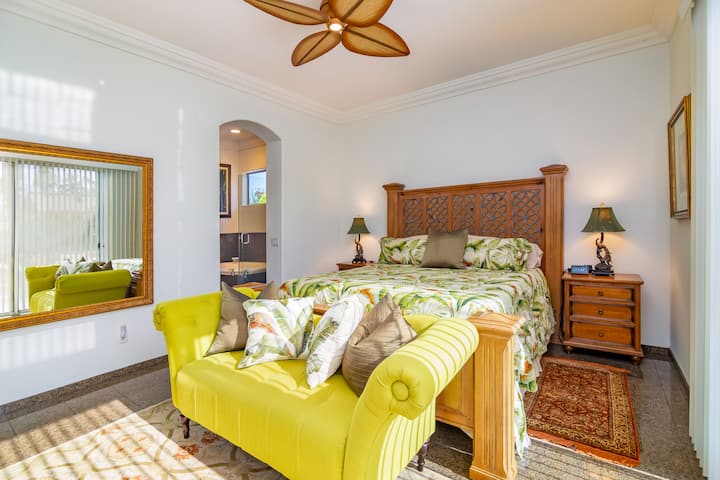 Master bedroom with master bathroom attached and entrance to back yard. Comfortable King bed.