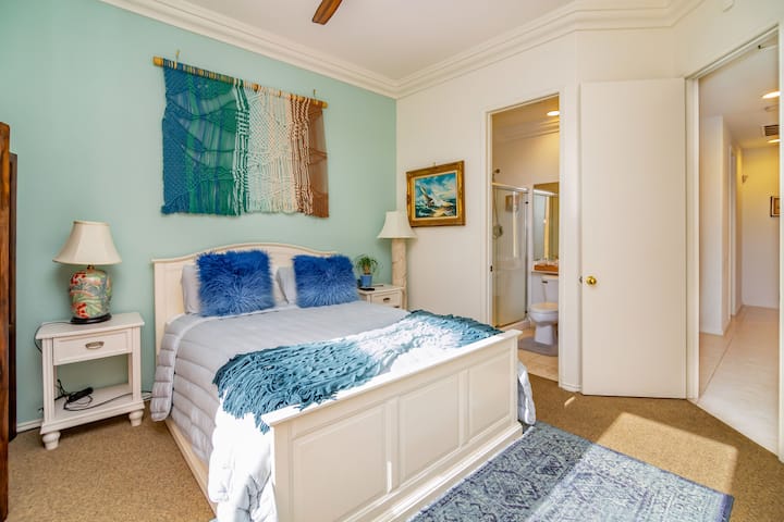 Second bedroom, with its own bathroom and  french door entrance to the back yard.