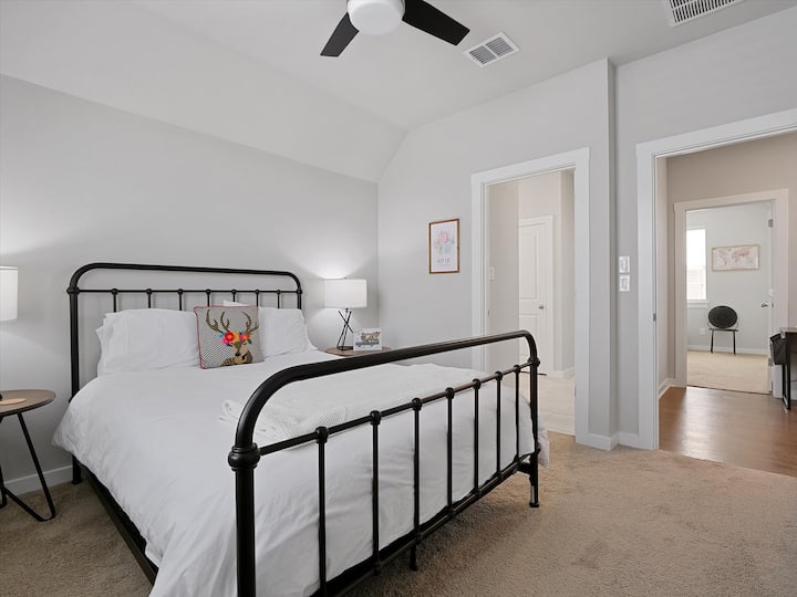 Upstairs Queen bedroom. Upstairs Queen bedroom and twin bedroom share an adjoining bathroom.