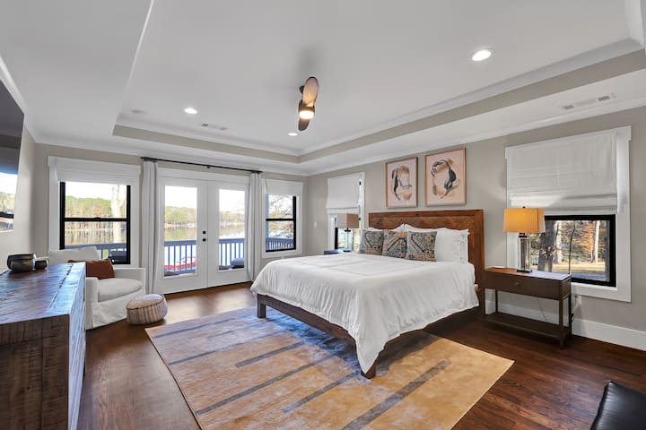 Master bedroom has gorgeous views of the lake.