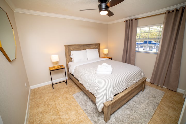 Bedroom #2 offers a comfortable queen size bed. This room offers a smart TV and a closet.