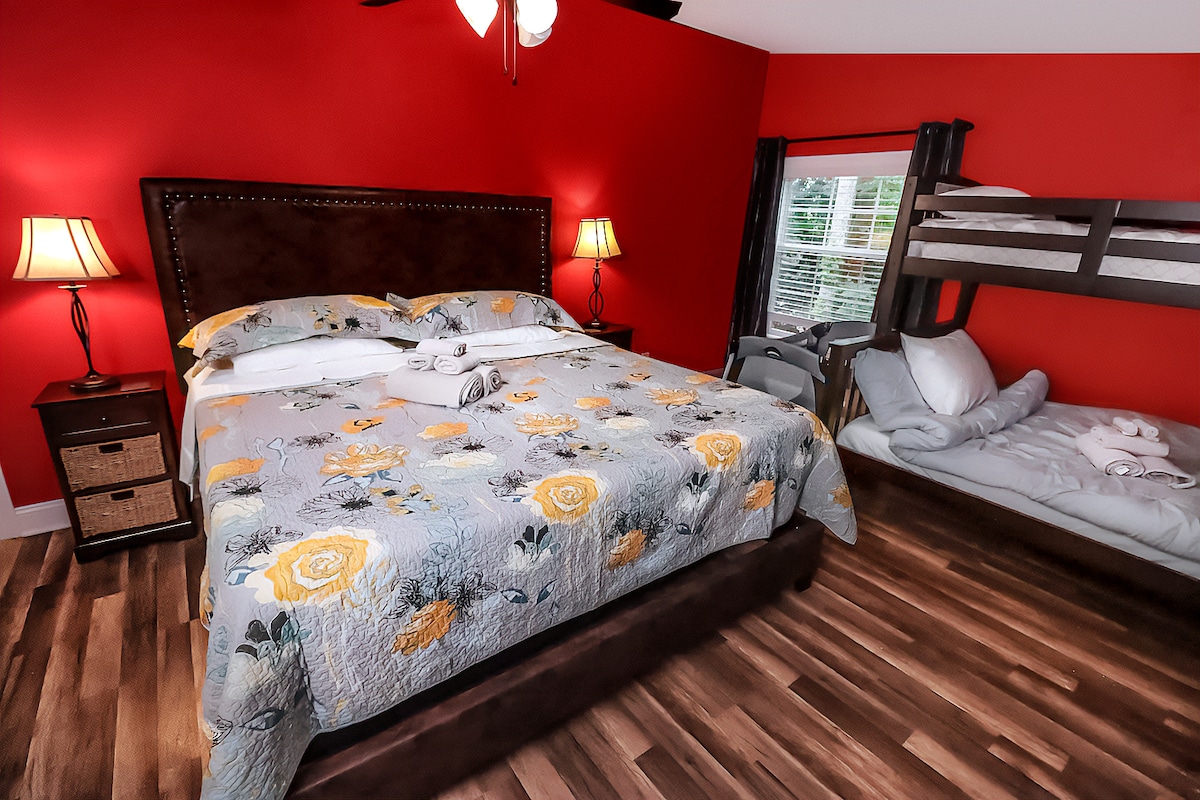 The second bedroom is perfect for families with a king bed, a twin over full bunk bed and a crib