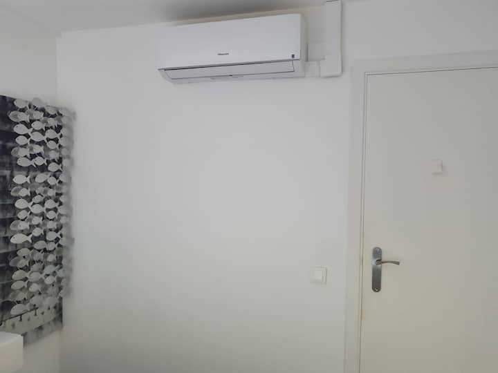 aire acondicionado en dormitorio