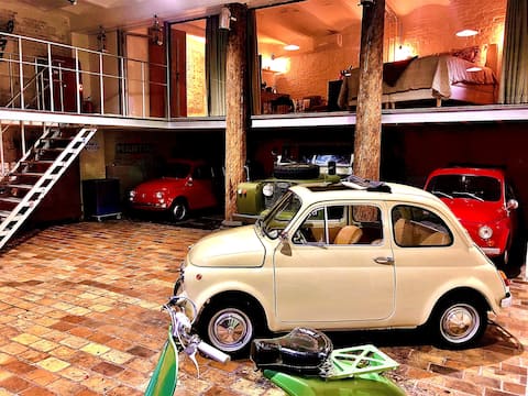 studio with oldtimer view in industrial building