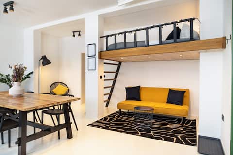 Modern Loft with Sandstone Vaults + Free Parking