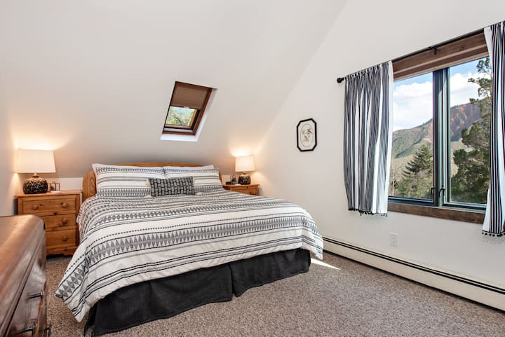 Bedroom 3:  Upper level family suite with king bed