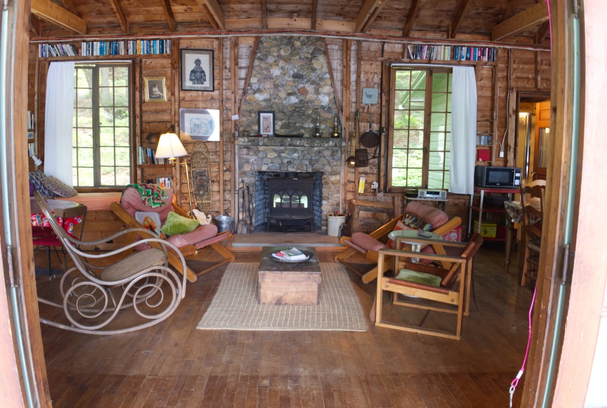 Main room of Sleepy Lagoon through French doors on porch.