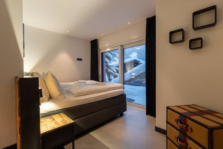 Sleeping room at 2nd level, next to elevator. It has it's own private terrace outside