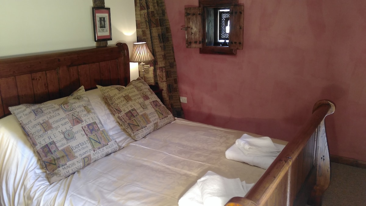 Cama tamaño king en la habitación 1