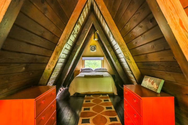 The loft with a double sized bed.  Super cozy!