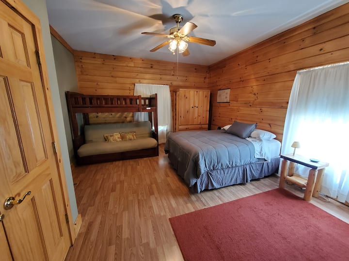 Master bedroom with private full bathroom and laundry room; located on the 1st floor