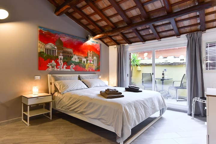 Attic openspace with Two Terraces InTrastevere!