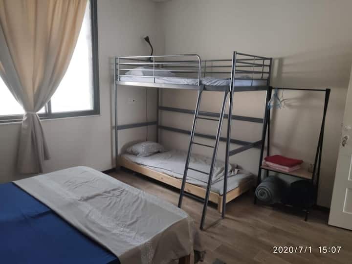 Room #1 with an extra bed. please note that an extra bad availible by request