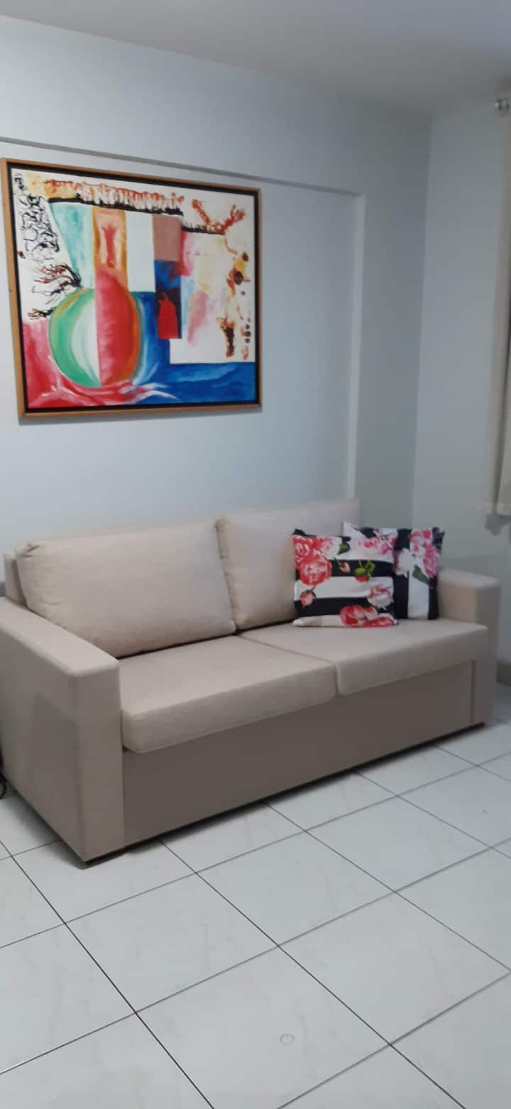 Sala de estar con sofá cama