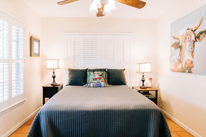 Wake up to sunrise and birdsong! This queen sized bed is super comfy and a Smart TV is also included (not pictured).