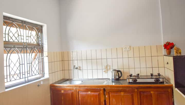 We also provide pots and pans, pressure cooker, plates, bowls and cutlery.
