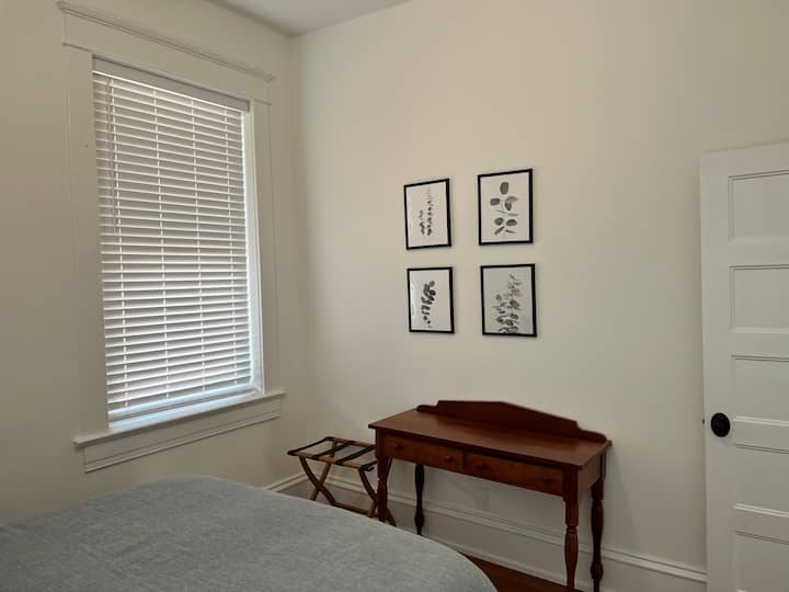 Bedroom 1 features large windows, spacious closet, ceiling fan with light, and a 12" Zinus Green Tea Infused memory foam mattress for uncompromised comfort.