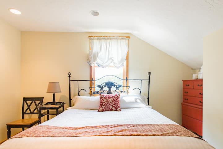 King Bedroom with Shared Bathroom. Located on the second floor and sleeps 2.
