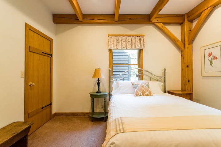 First Floor Queen Bedroom.  Shared bathroom on the first floor with a shower. Sleeps 2.