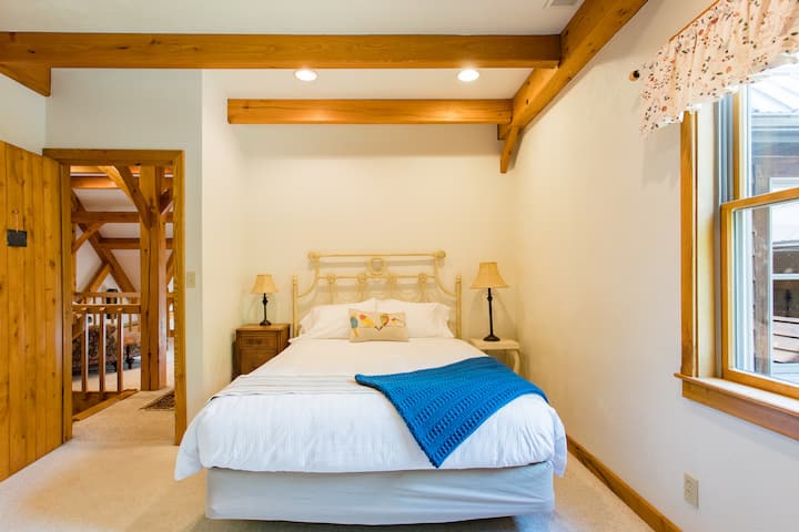 Library Queen Bedroom.  Located on the second floor. Uses the tub/shower combo bathroom and sleeps 2.