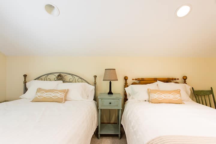 Queen and Double Bedroom with a Shared Bathroom.  Located on the second floor and sleeps 4.