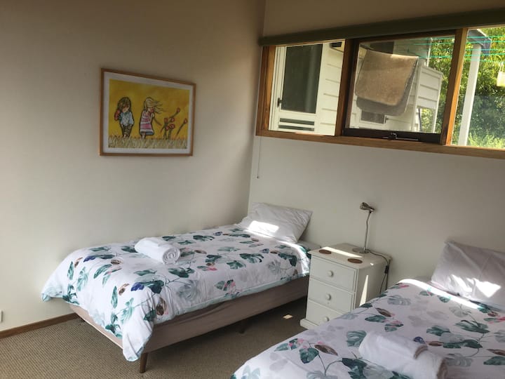 4th bedroom downstairs with two singles