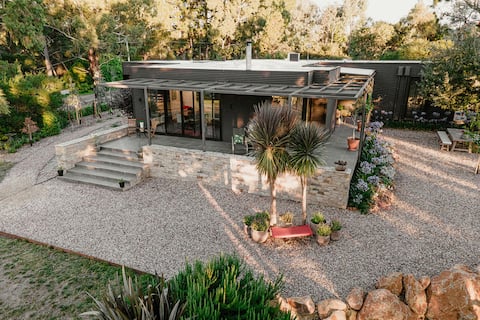 Bohemia  Luxury house in private garden setting.