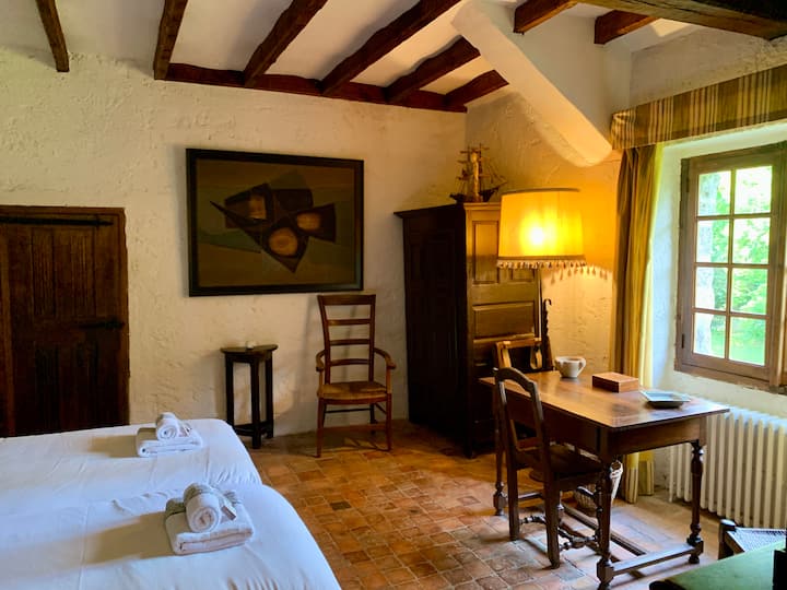 The third bedroom on the first floor has garden views.