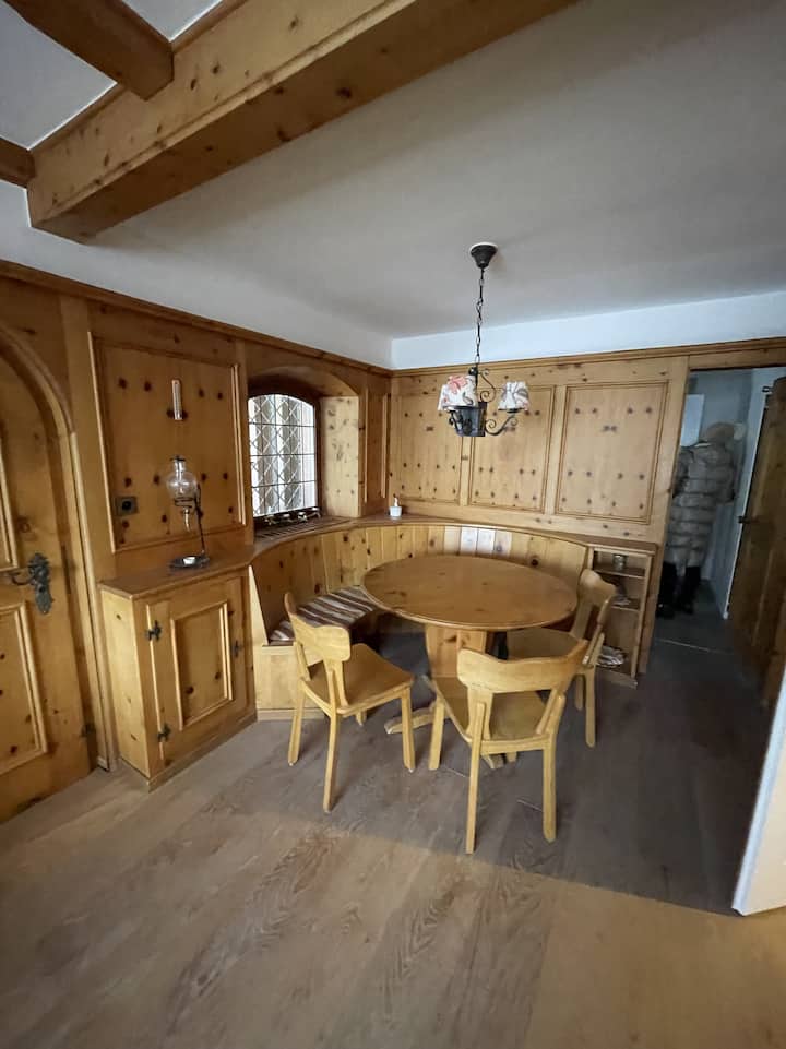 Dining room (Arvenstube) with corner bench and table for about 6 people ...