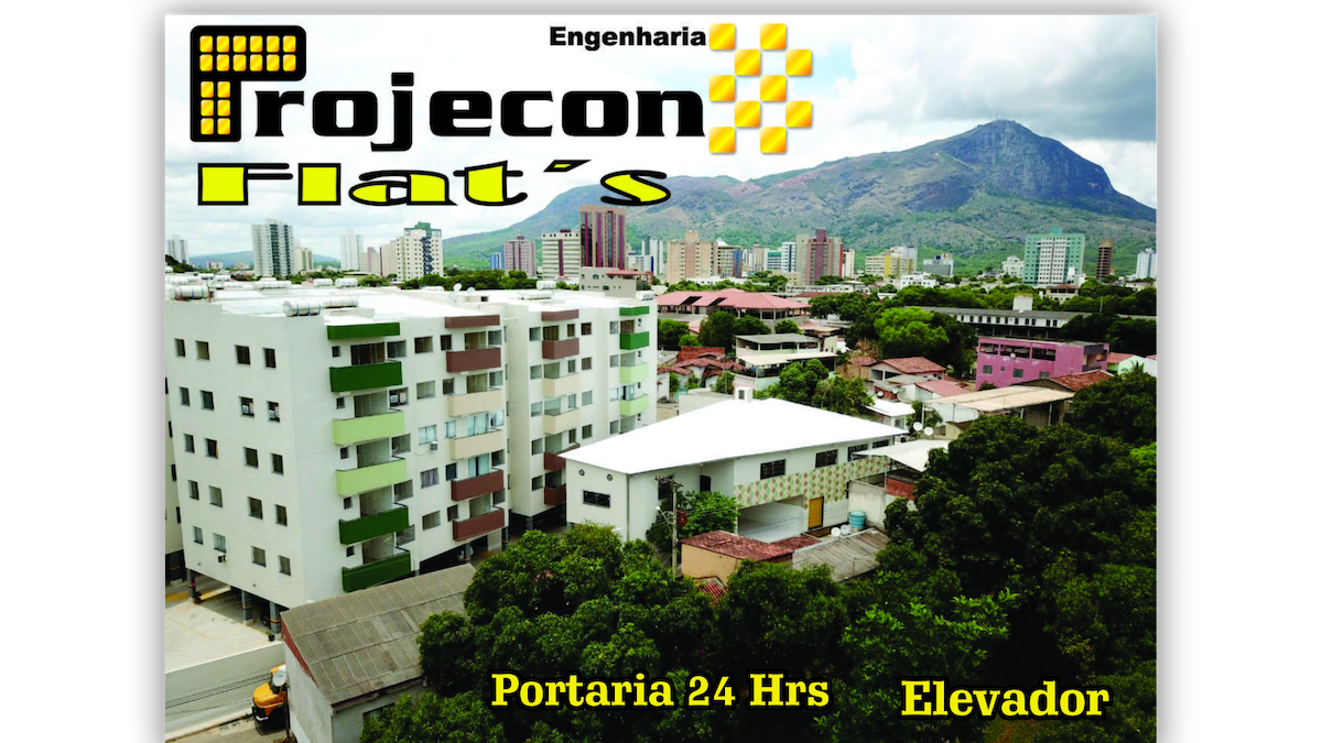 An aerial view showcases a modern building complex nestled against a mountainous backdrop. The structure features multiple floors with balconies, surrounded by lush greenery. Text highlights include 24-hour reception and elevator access, emphasizing convenience and accessibility.