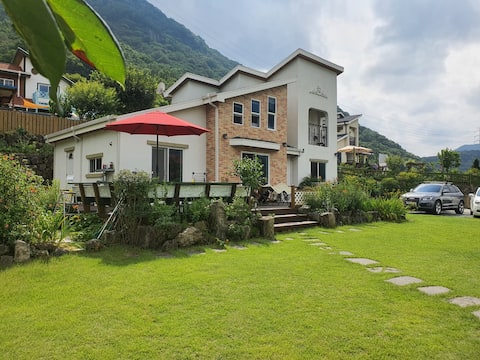 A two-story private pension with a nice view of the mountain