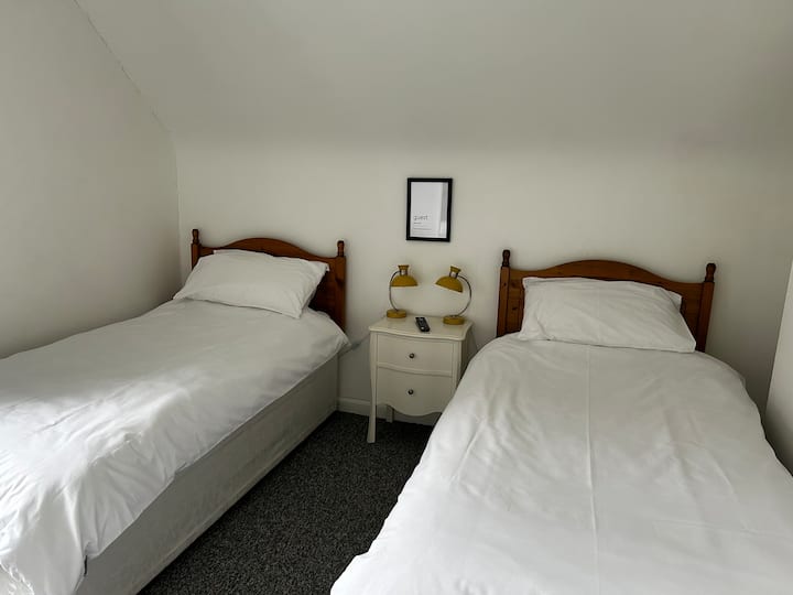 2 x Single Beds in upstairs room.