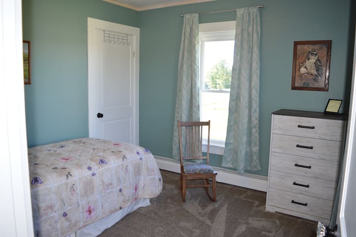 One twin bed in bedroom